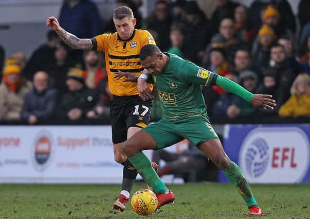 Picture by Gareth Williams/AHPIX.com; Football; Sky Bet League Two; Newport County v Mansfield Town; 9/2/2019  KO 15.00; Rodney Parade; copyright picture; Howard Roe/AHPIX.com; Mansfield skipper Krystian Pearce wrestles with Newport's Scot Bennett