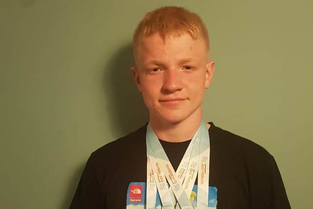 Tom Trueman with his medals.