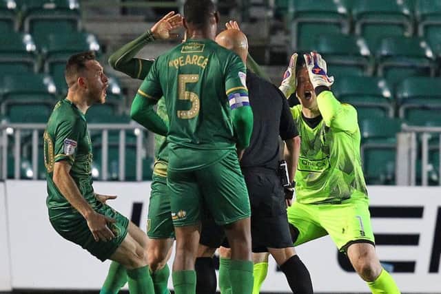 Picture by Gareth Williams/AHPIX.com; Football; Sky Bet League Two Play-Off Semi-Final; Newport County v Mansfield Town; 9/5/2019; KO 19.45; Rodney Parade; copyright picture; Howard Roe/AHPIX.com; Disbelief from Conrad Logan and Gethin Jones after referee Charles Brakespear awarded Newport a penalty