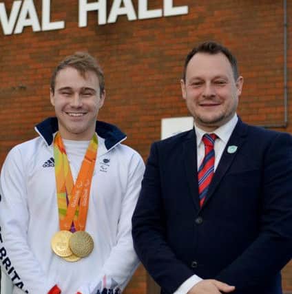 Coun Zadrozny, right, launches the plans for Kirkby's new leisure centre with swimming star Ollie Hynd.