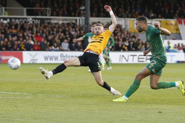 CJ Hamilton scores at Newport in the first leg.