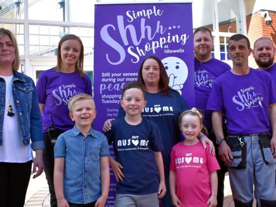 Laura and Logan Walker, 5, Rhys, 9, Roxie, 9, and mum,Suzanne Jacques. Back; Manager, Chloe ODonnell, Michael, Carl and Ian of Idlewells Shopping Centre.