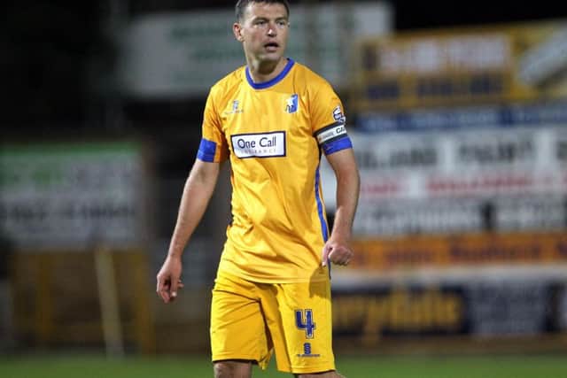 John Dempster was part of Mansfield Town's promotion-winning side under Paul Cox.