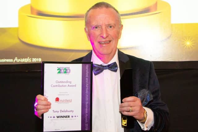 Tony Delahunty with his outstanding contribution award.