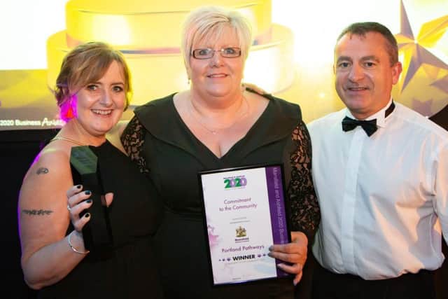 The Portland Pathways team, Nikki Amirsaeedi, Cheryl Levers and Simon Carter, with their commitment to the community award.