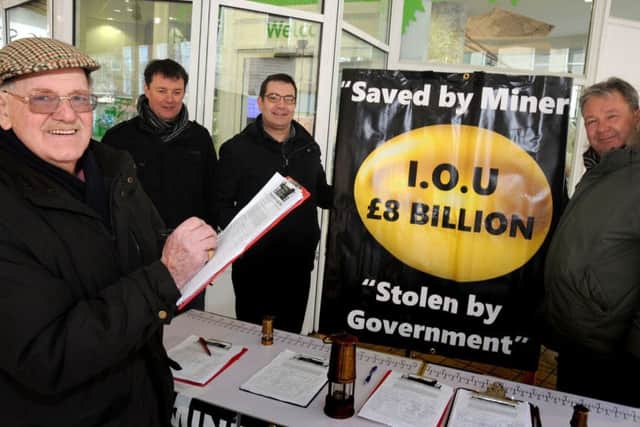 Donald Gibson adds his signiture to the Mineworkers Pension Fairplay petition, which has reached over 5000 names collected by Brian Glasper, Mick Newton and Charles Chiverton.
