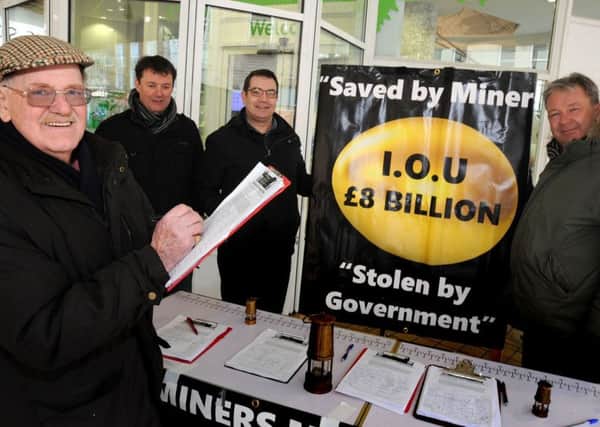 Donald Gibson adds his signiture to the Mineworkers Pension Fairplay petition, which has reached over 5000 names collected by Brian Glasper, Mick Newton and Charles Chiverton.