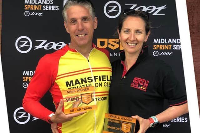 Tony Alcock and Hannah Shooter celebrate their wins at the Southwell Triathlon.