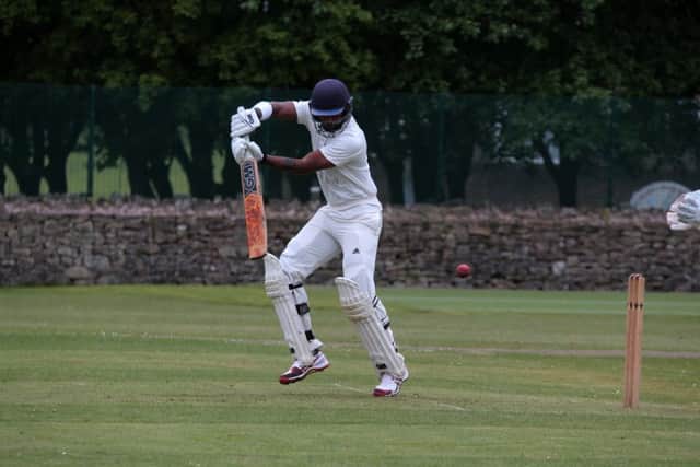 Millers' batsman Anuk Ferdnando forces Brandon Pritchard backwards of square.