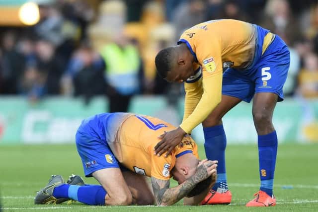 Picture by Howard Roe/AHPIX.com;Football;Skybet; Play Off Semi Final;Mansfield Town v Newport County12/5/2019  KO 6.00pm; One Call Stadium;copyright picture;Howard Roe;07973 739229Stag's Krystian Peace consoles Ryan Sweeney after losing the penalty shoot out