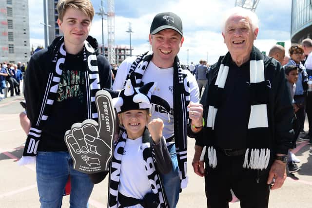 Derby County fans light up Wembley Way.