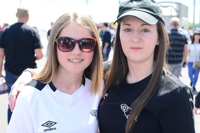 Derby County fans light up Wembley Way.