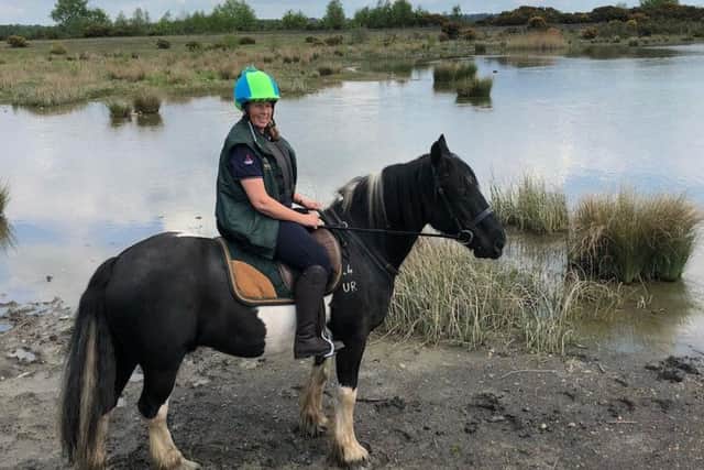 Helen Ward riding her horse Apachie at Newstead Abbey.