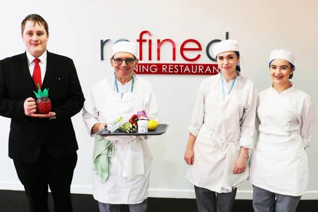 Creating the special graduation meal are, from left: Dominic Smith, Colin Watson, Tamara Tomlinson and Deanna Burton.