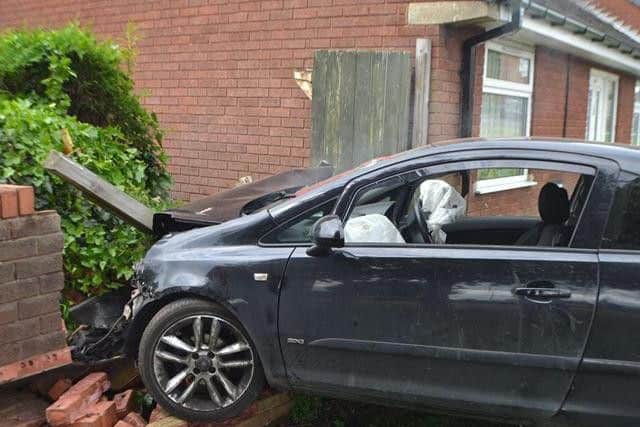 Two people, believed to be the driver and passenger, fled the scene after their car crashed into a bungalow's wall in Shirebrook. (IMAGE: Paw Waby, Facebook)