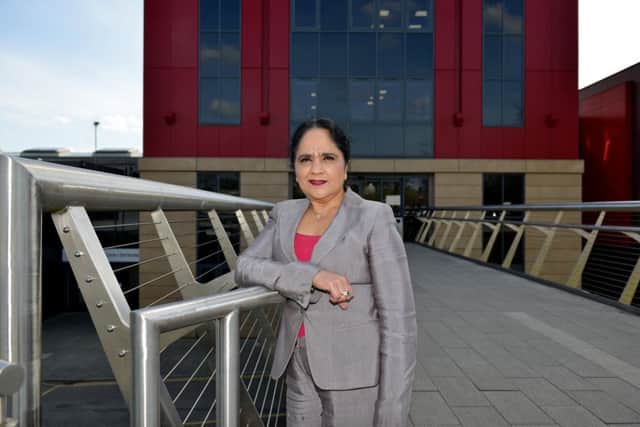 Former chief executive Dame Asha Khemka outside the college.