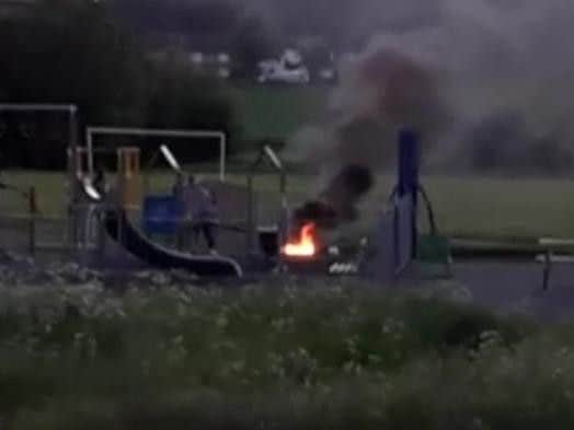 Youngsters pictured at a fire at the Carrs playground Warsop.