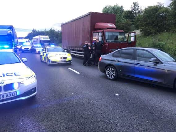 HGV carrying stolen goods gives chase to police on M1 before crashing into barrier