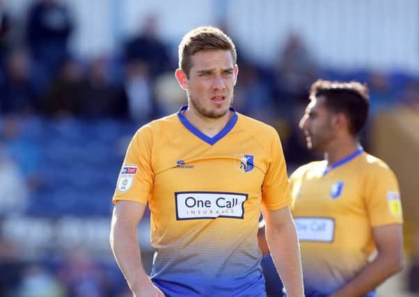 Timi Elsnik in Mansfield Town action.