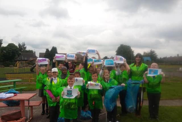 Pupils from Wainwright Academy taking part in International Clean Up day at Ladybrook Park, Mansfield.