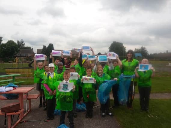 Pupils from Wainwright Academy taking part in International Clean Up day at Ladybrook Park, Mansfield.
