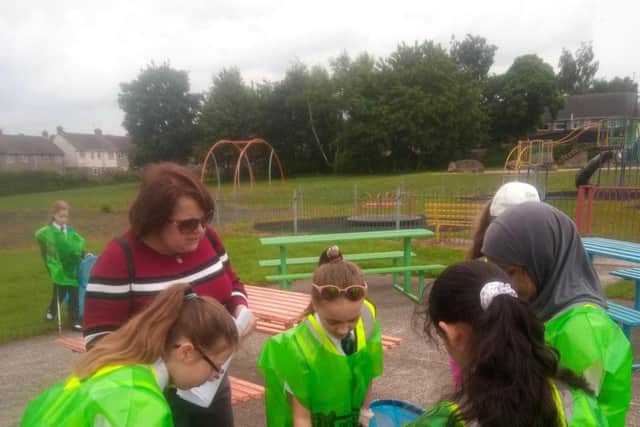 Pupils from Wainwright Academy taking part in International Clean Up day at Ladybrook Park, Mansfield.