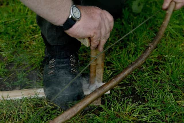 Bushcraft instructor Martin Rollin demonstrating how to make fire