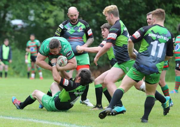 Francis Appleton bursts through the Derby defence to score Wolf Hunt's second try of the game   - Pic by Richard Parkes