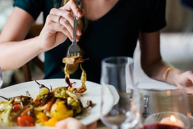 Eat according to normal mealtimes once you arrive at your destination