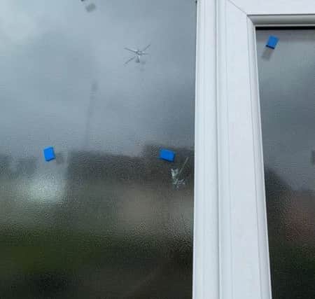 The damage to the windows.