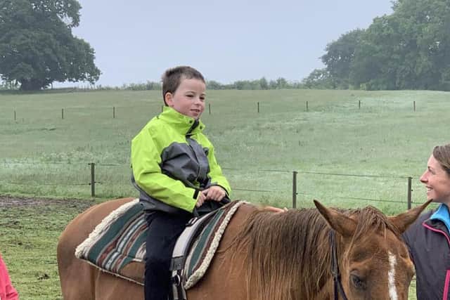 Riley during equine therapy
