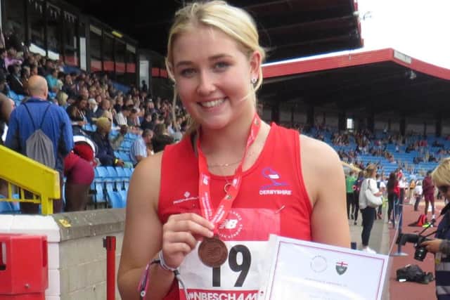 Kelsey Pearce with her medal at the English Schools Championships.