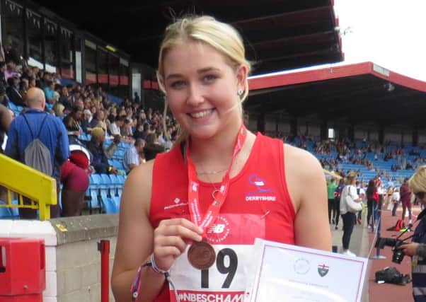 Kelsey Pearce with her medal at the English Schools Championships.