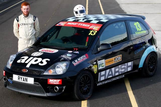 Mansfield driver Ryan Faulconbridge by his Ford Fiesta car.