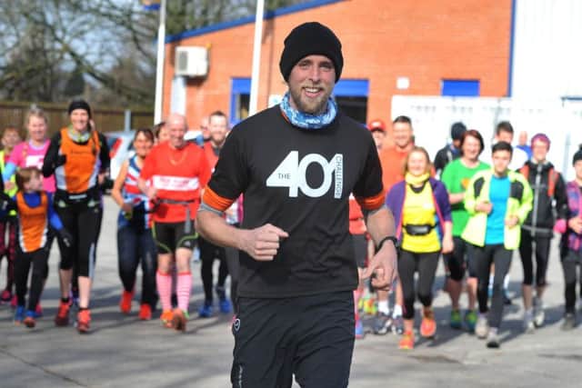 Ben Smith and fellow runners during his challenge of running 401 marathons in 401 days.