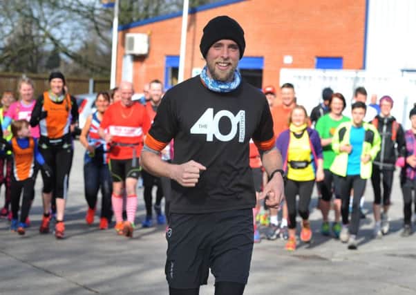 Ben Smith and fellow runners during his challenge of running 401 marathons in 401 days.