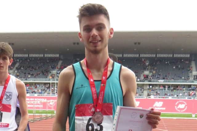 Luke Duffy, of Mansfield Harriers, with his bronze medal at the English Schools Championships.