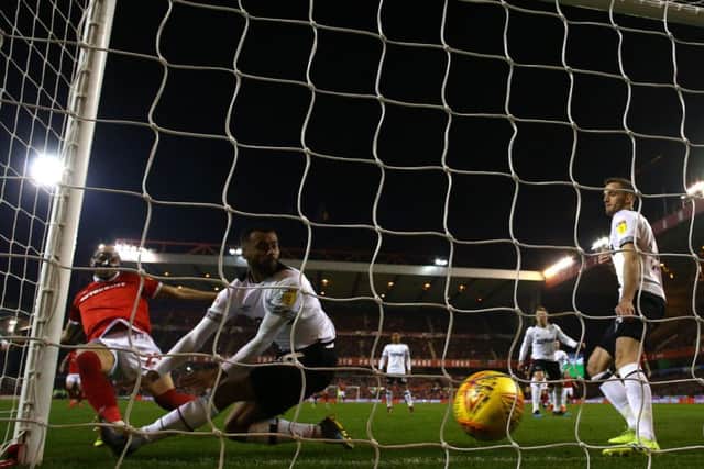 NOTTINGHAM, ENGLAND - FEBRUARY 25: Yohan Benalouane of Nottingham Forest scores a goal during the Sky Bet Championship match between Nottingham Forest and Derby County at City Ground on February 25, 2019 in Nottingham, England. (Photo by Matthew Lewis/Getty Images)