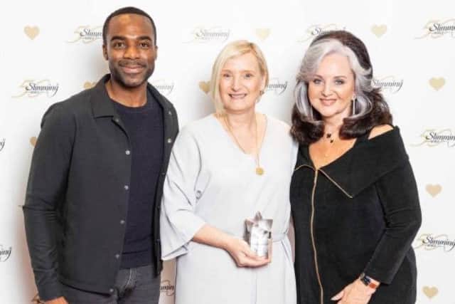 Group Consultant Sue Redfern, centre, with TV presenter Ore Oduba, left, and Slimming World founder Margaret Miles Bramwell.