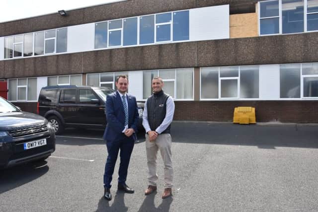 Councillor Jason Zadrozny, council leader, with project manager John Brame outside the building.