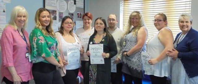 Volunteers with thier awards at the Warsop Childrens Centre