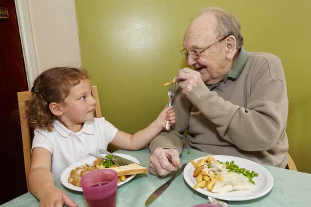Ellie-Mai Weatherall shares a joke with her grandad for the day.