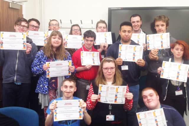 Some of the students who took part in the challenge with their certificates
