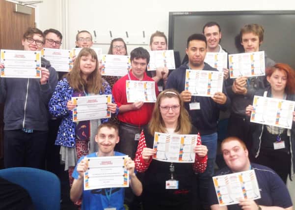 Some of the students who took part in the challenge with their certificates