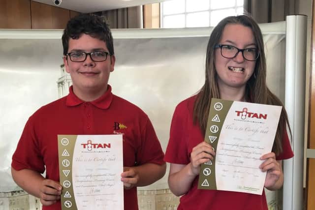 Proud Alfy and Freya with their independent traveller awards