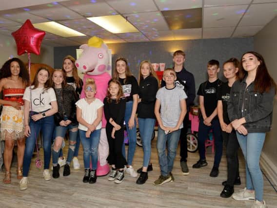 Charity funday in aid of Clic Sargent at Blidworth Miners Welfare Social Club, organised by friends Kaci-Jane Pointon-Gullett, 15 and Izzy Lawton, 15, the girls are pictured with friends at the event.
