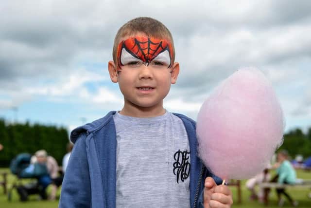Charity funday in aid of Clic Sargent at Blidworth Miners Welfare Social Club, pictured about to tuck into candyfloss is five year old Grayson Sharp.