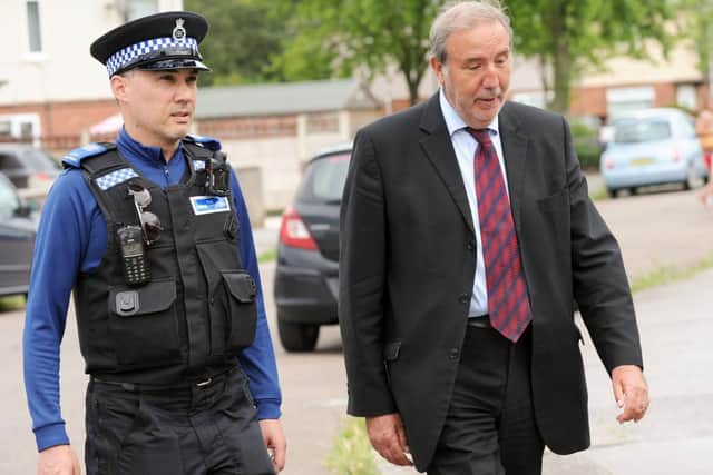 The Nottinghamshire Police and Crime Commissioner, Paddy Tipping, right, and PCSO Keith Crowhurst, pictured on their walkabout around Bilsthorpe on Monday.