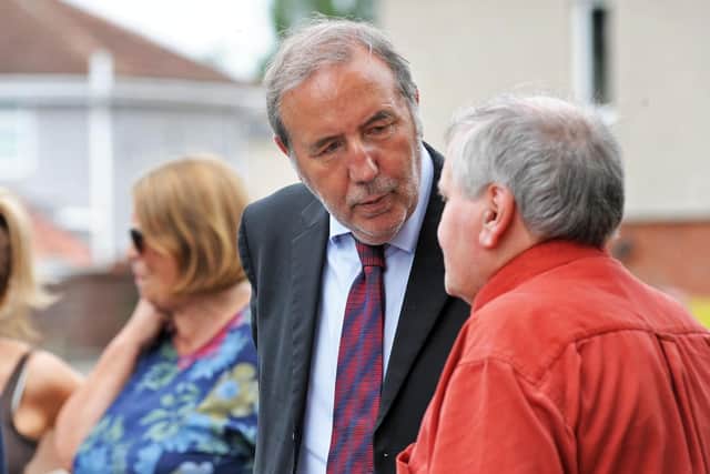 The Nottinghamshire Police and Crime Commissioner, Paddy Tipping, listens to the concerns of Bilsthorpe residents on a walkabout on Monday.