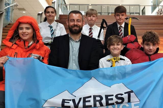 Everest climber Ricky Munday with from left: Ellena Keigher, Renanna Davies, Callum Nussey, Josh Towers, Charlie Jones and Josh Hutton.
